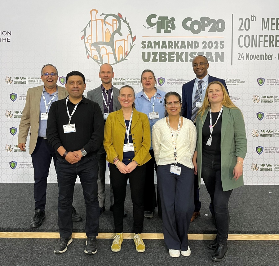 Delegation in front of CITES CoP20 logo