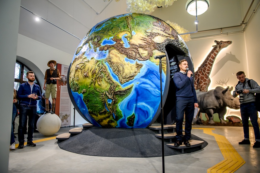 A large globe in a museum room